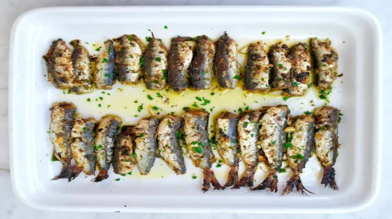Baked sardines with Mediterranean herbs and vegetables recipe oven baked sardines