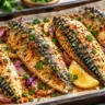 Baked mackerel with lemon, garlic, parsley, and herbs