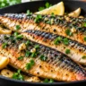 Pan-fried mackerel with crispy skin, lemon, garlic, and parsley